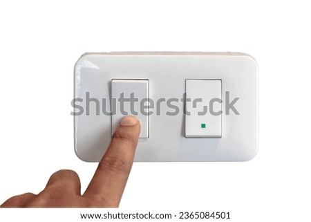 Close up fingers is turning on or turning off the light-switch on white backgrounds.