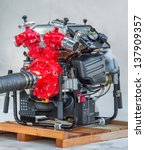 Close up Fire fighting pump on wood rack