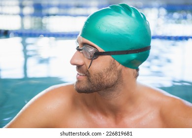 Close up of a fit swimmer in the pool at leisure center - Powered by Shutterstock