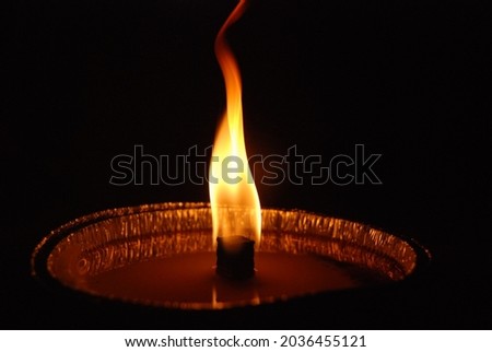 Close up of flame and fire in the air and burning wood logs