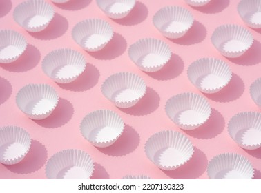 Close Up Flat Lay Soft Light Empty White Paper Round Cupcake Containers On Sweet Pink Minimal Background.idea For Dessert Backdrop,bakery Supplies Shop Wallpaper.