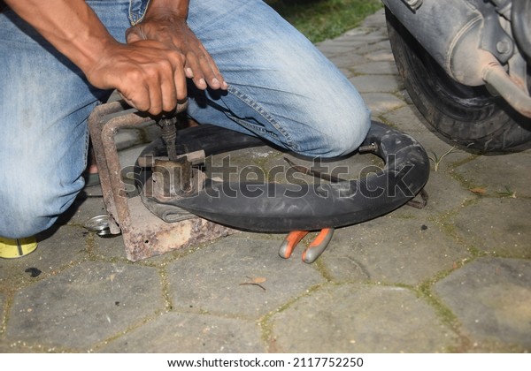close up of flat tire\
repairs