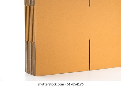 Close Up Flattened Cardboard Box On White Background