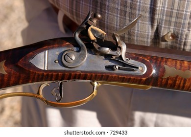 Close up of the Flint Trigger of a antique Black Powder Muzzle Loader Flint Flint Lock Rifle