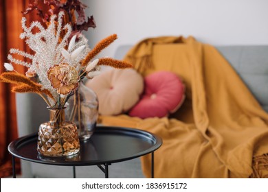 Close Up Of Flowers In Vase On Table In Living Room. Home Decoration In Fall Colors. Copy Space.