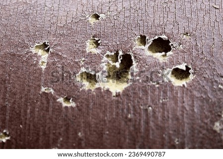 close up of a foam sofa with holes, torn, damaged. foam sofa texture for background