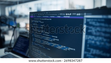 Close Up Focus on Desktop Computer Screen. Digital Display Showing Coding Language User Interface. Software Engineer Programming Innovative e-Commerce Software in Office