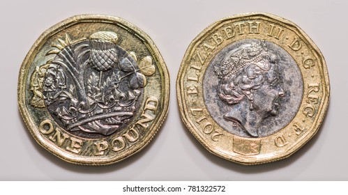 Close Up Focus Photos Of New United Kingdom Pound Coin Isolated On A White Background