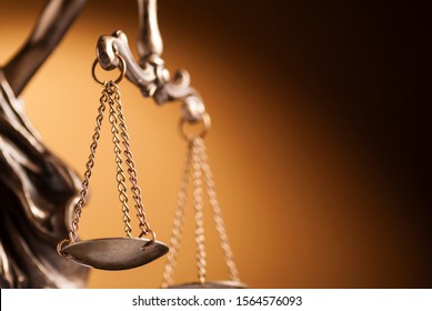 Close up focus to the scales of Justice