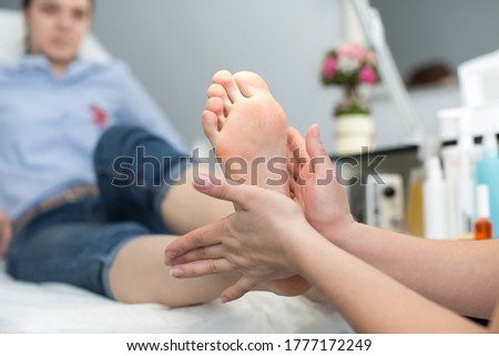 Close up of a foot massage at the spa