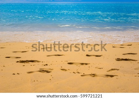 close up Footmark in the Sand   on Beach at Thailand