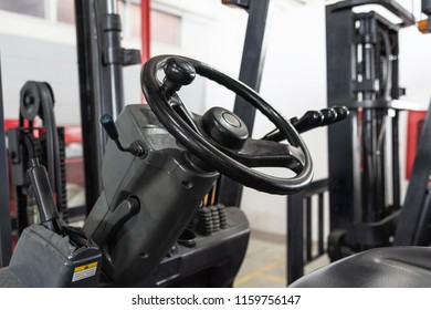 Close Up Of Forklift Steering Wheel, Forklift Driver