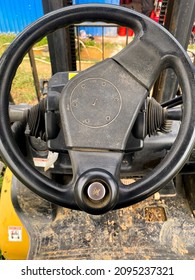 Close Up Of Forklift Steering Wheel, Forklift Driver At Mining Area