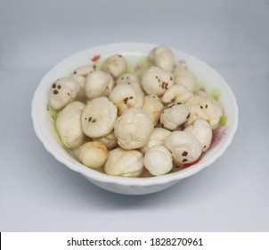 Close up of fox nuts in a white bowl, healthy vegan food and snack
