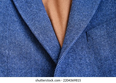 Close Up Fragment Of Blue Tweed Blazer Fabric With Pocket Fragment. Selective Focus.