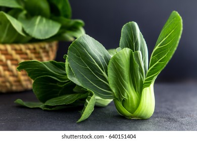 Close Up Fresh Baby Green Bok Choy On Black Background , Overhead Or Top View Shot