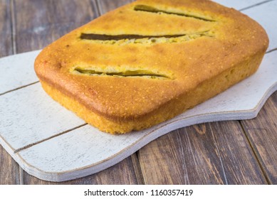 Close Up Of Fresh Baked Hatch Chili Pepper Cornbread On A Cutting Board.