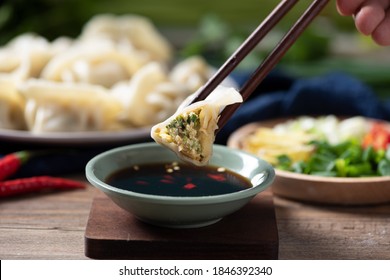 Close Up Fresh Boiled Dumplings . Chinese Food On Rustic Old Vintage Wooden Background.