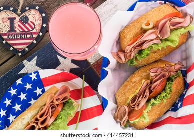 Close Up Of  Fresh Homemade Ham Sandwiches On Party Table For Forth Of July Celebration.