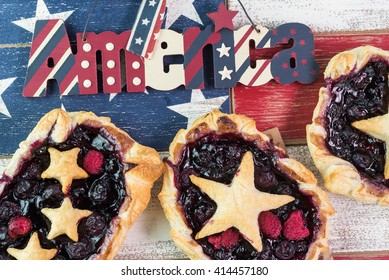 Close Up Of  Fresh Homemade Pies For Forth Of July Celebration On Wooden Background.