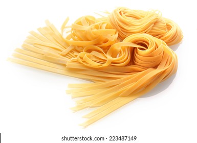Close Up Fresh Italian Fettuccine Pasta Isolated On White