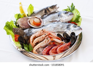 Close up of fresh mediterranean seafood on ice. - Powered by Shutterstock