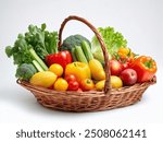 Close up of Fresh organic vegetables and fruits in wicker basket. Assorted fresh vegetables isolated on white background. Copy space. Health food.