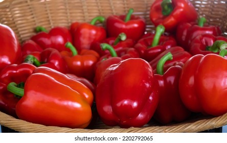 Close Up Of Fresh Red Peppers In A Basket At The Market