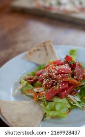 Close Up Of A Fresh Tuna Salad With Sesame Seeds And Pita Bread.