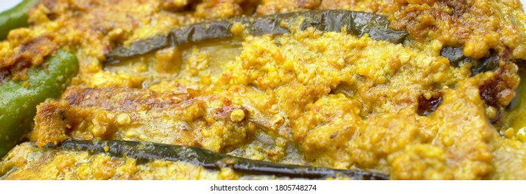 Close Up Of Fried Brinjal With Curd And Mustard Paste  Food Photography