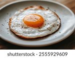 Close up Fried eggs on a white plate