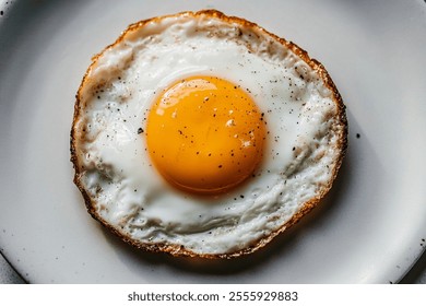 Close up Fried eggs on a white plate