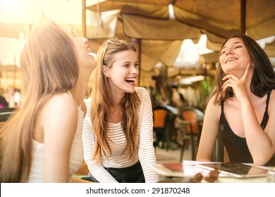 Close Friends Sitting Together And Laughing