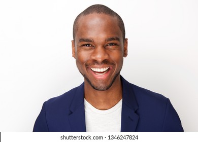 Close Up Front Portrait Of Handsome Black Man Smiling Against Isolated White Background