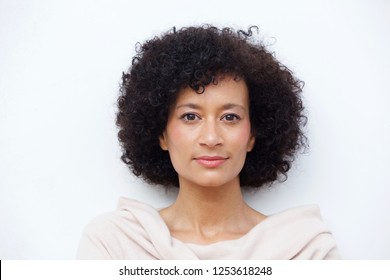 Close Up Front Portrait Of And Older African American Woman Against White Background