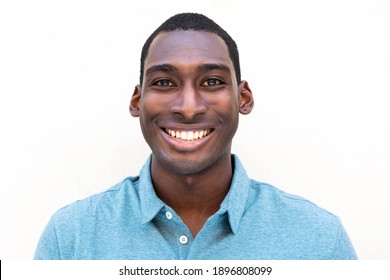 Close Up Front Portrait Smiling Young Black Man Against Isolated White Background 