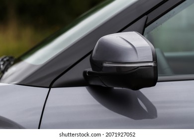 Close Up Front View Of Car Side Mirror. Front Rear View Mirror On The Car Window. Car Exterior Details.