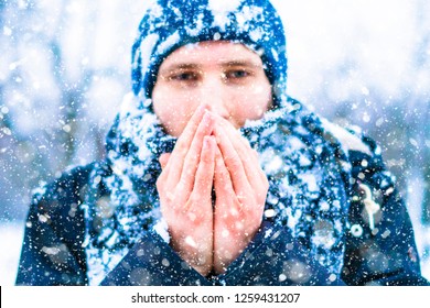 Close Up Frost Man's Face With Scarf Covered By Snow On A Winter Day