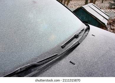 Close up of frost on the car glass and body in winter. Volkswagen logo. Poland, Europe                  