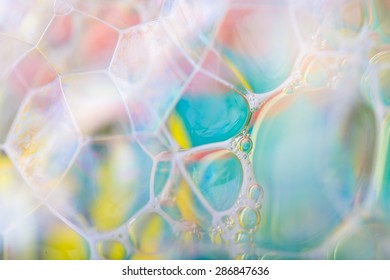 Close Up Of Froth, Abstract Background. Air Bubbles In Soap Foam.