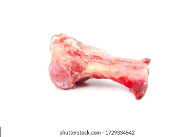 Close up frozen fresh pork bones with red meat stuck To be used for making pork bone broth on a white background - Shutterstock ID 1729334542