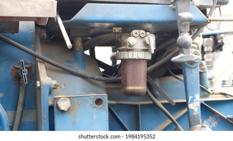 A Close Up Of A Fuel Filter On A Tractor