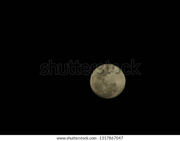 close up of full
moon, bright big moon,
India