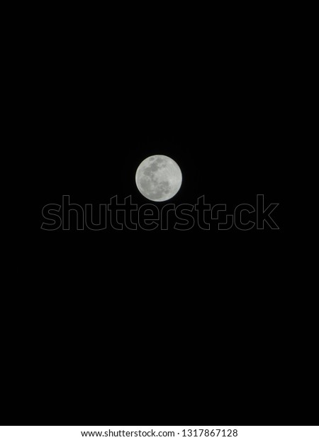 close up of full\
moon, bright big moon,\
India