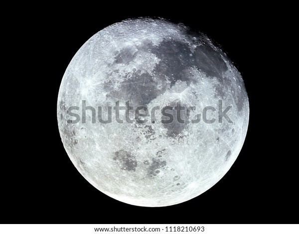 Close up of full moon seen with the telescope from
northern hemisphere. Showing detail of moon surface, moon texture
and craters. A Night Panorama Lunar Astrophotography isolated
background concept. 