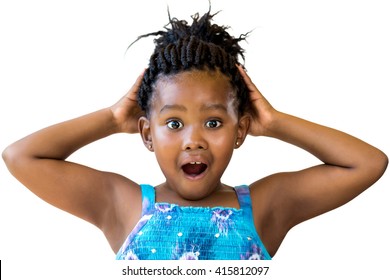 Close Up Fun Portrait Of Cute Black Girl With Hands On Head.Youngster With Open Mouth And Shocking Facial Expression Isolated On White Background.