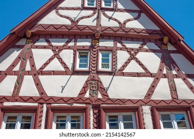 Close up of gable wall of old house with ornate half-timbering in southern Germany