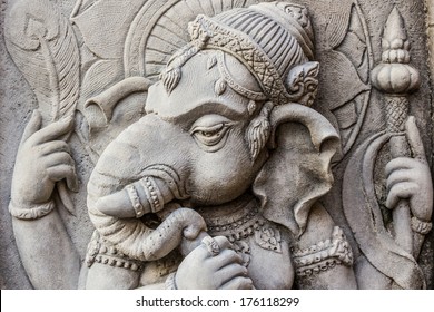 Close up ganesh hindu god face, Ganesha made from stucco work. 