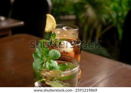 Close up garnish cold drinks lychee tea, lemon squash, mango squash and americano squash