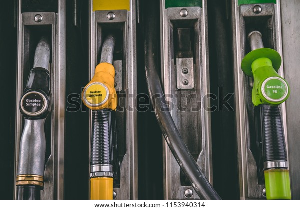 Close up\
of gasoline and diesel service station\
pumps